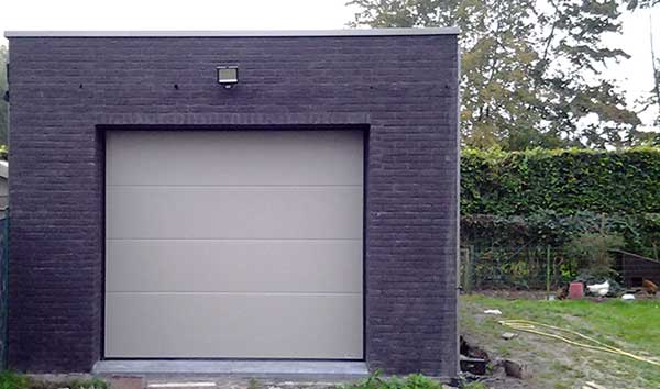 metselwerk, opbouw plat dak en voegwerk garage