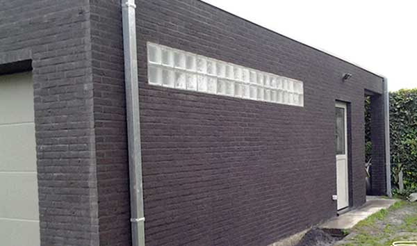 metselwerk, opbouw plat dak en voegwerk garage met berging